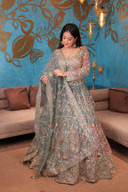 Green intricate pastel lehenga