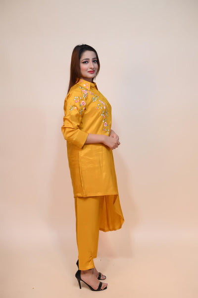 woman posing wearing yellow silk blend dress