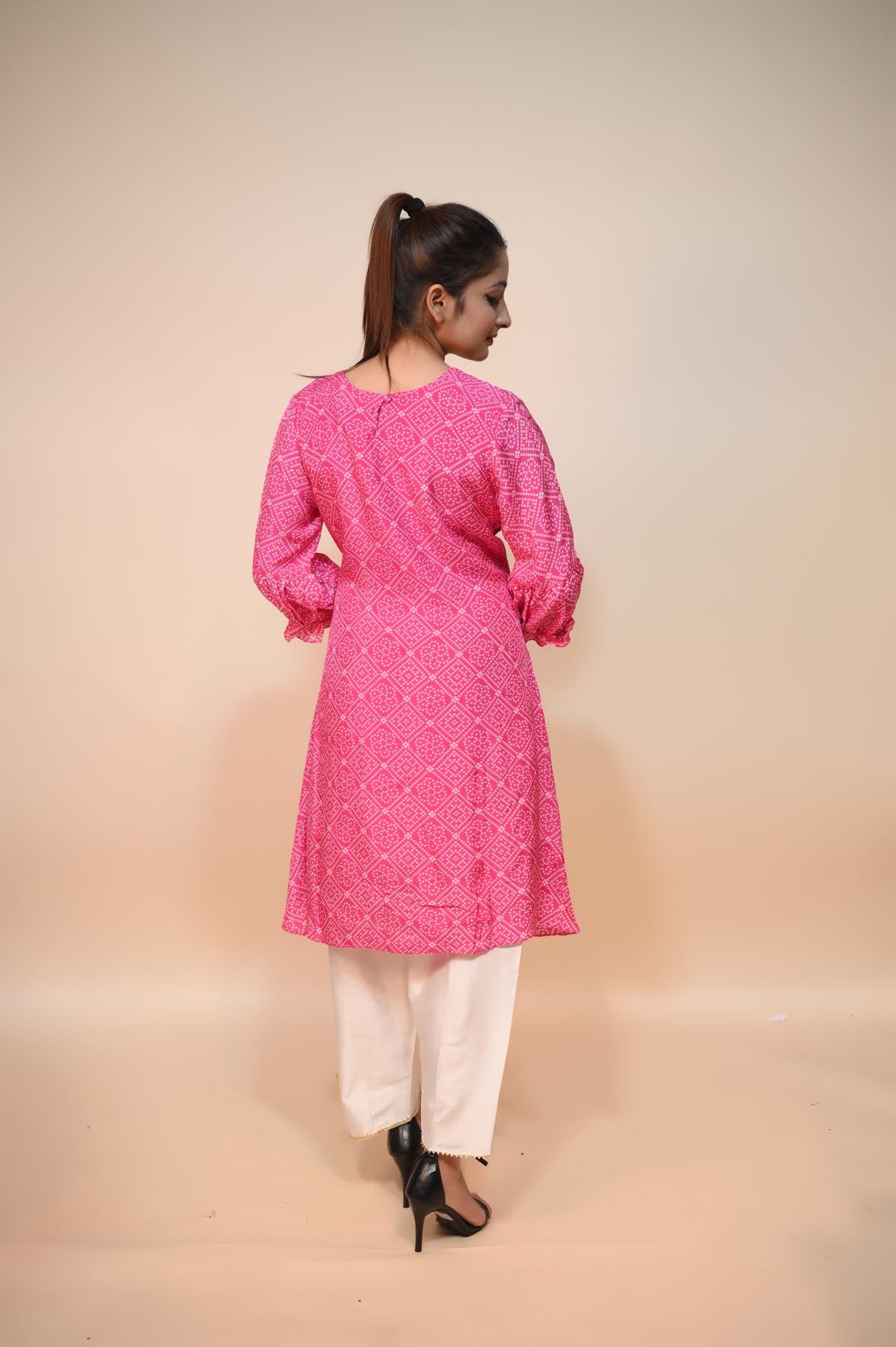full back look of pink cotton silk dress