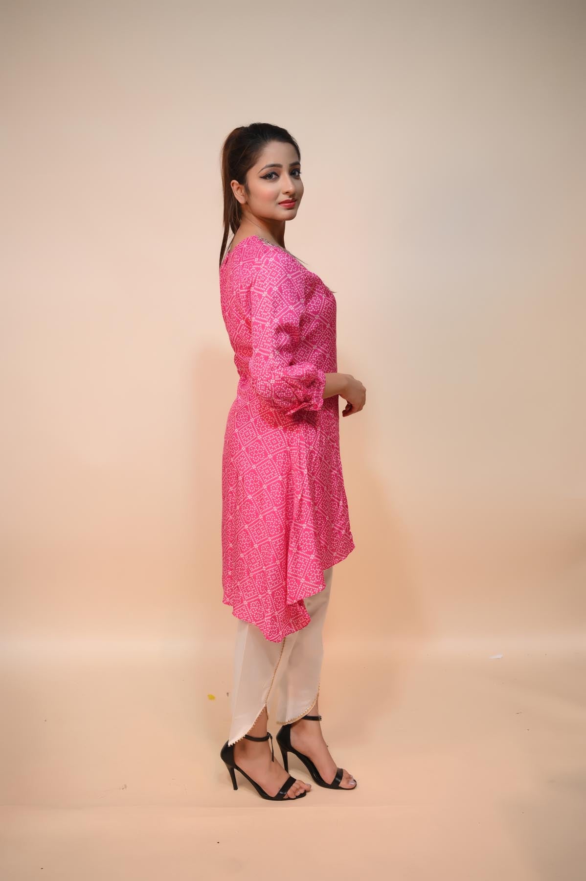 model posing wearing pink cotton silk dress