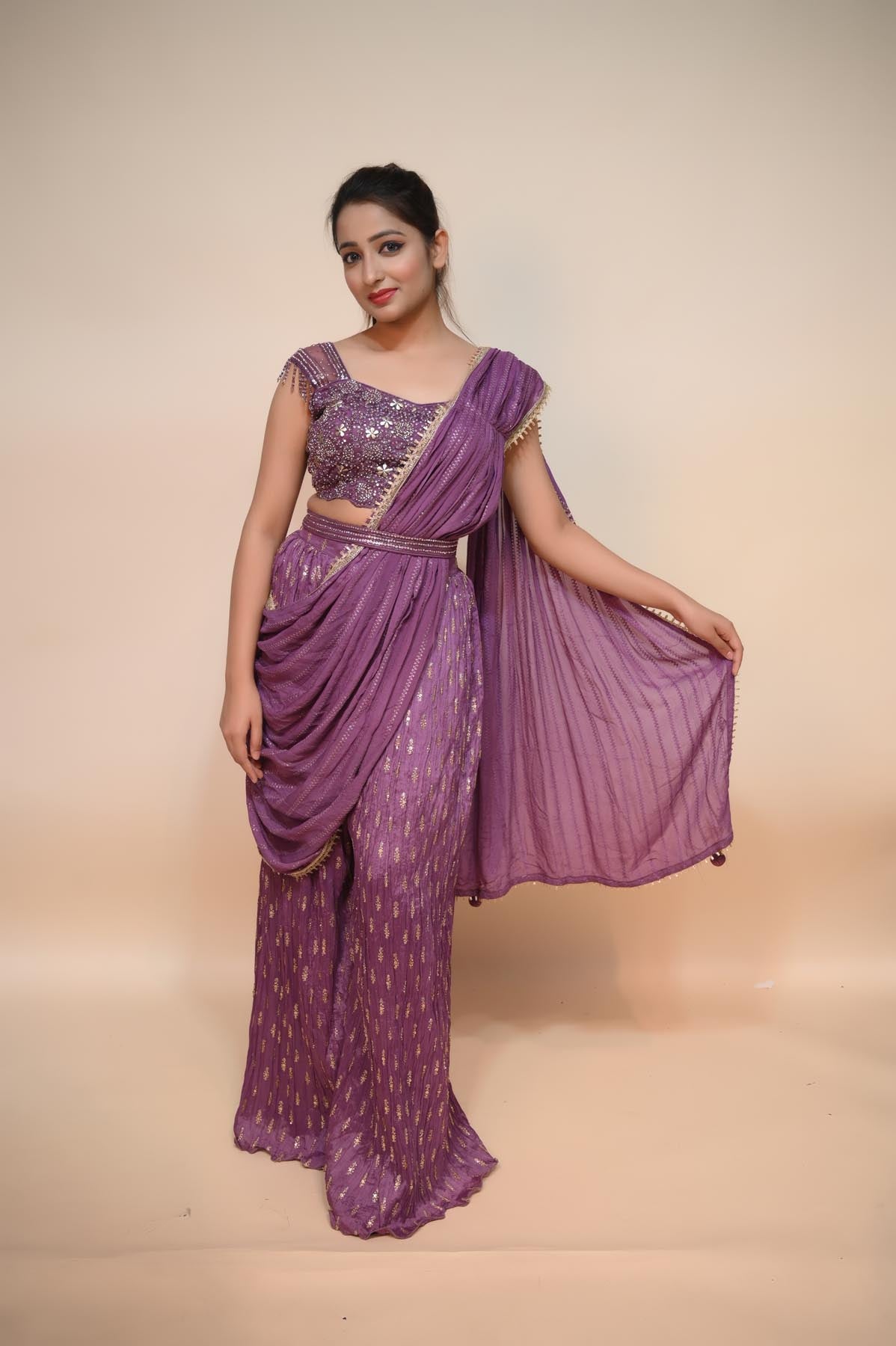 full front look of purple net saree