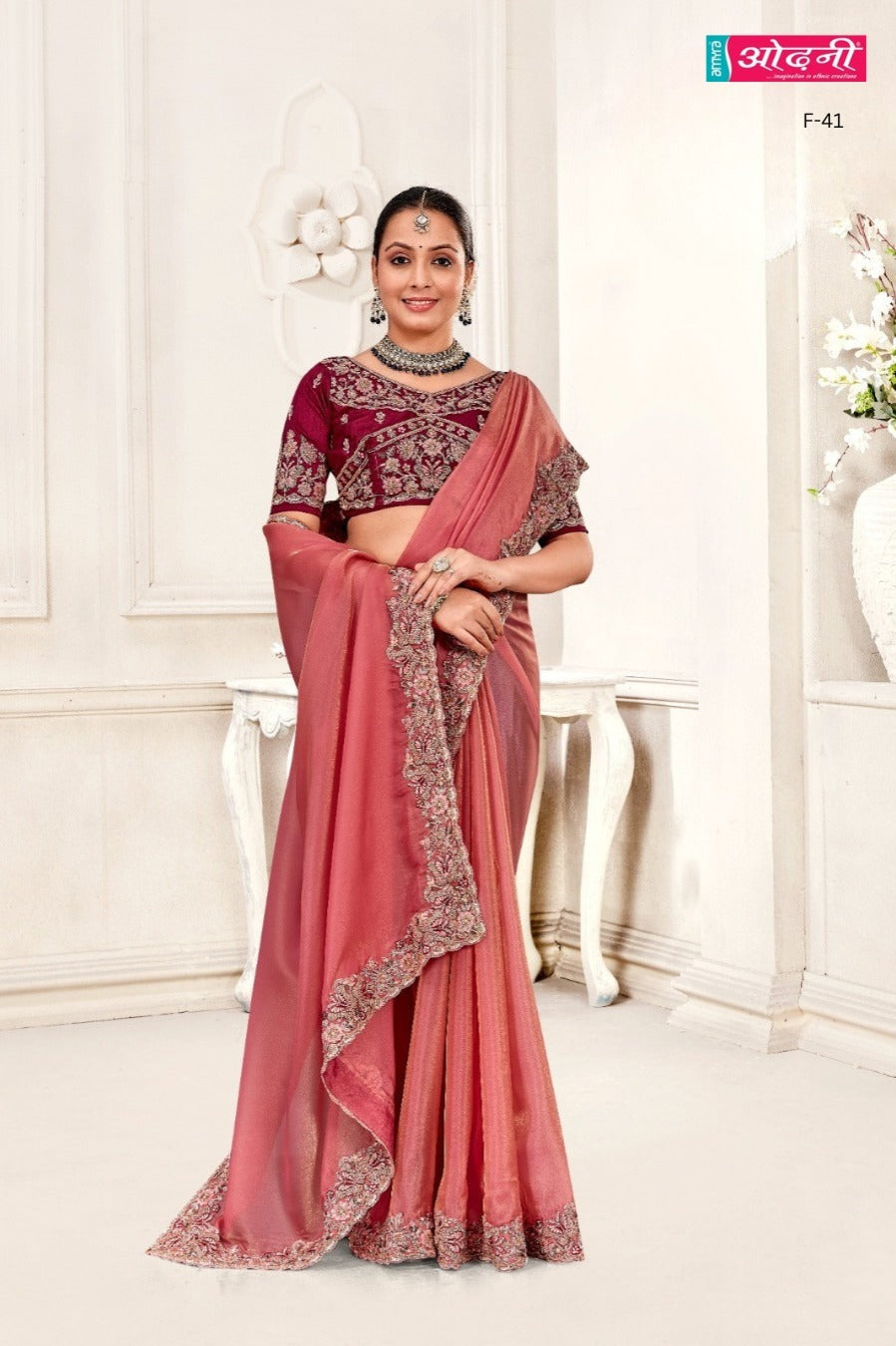 Vintage Rose & Maroon Opulence Saree (F-41 GS-25) worn by a model in a luxurious setting. Main image