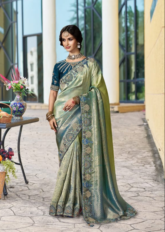 Pista Green Silk Saree with Teal Woven Border