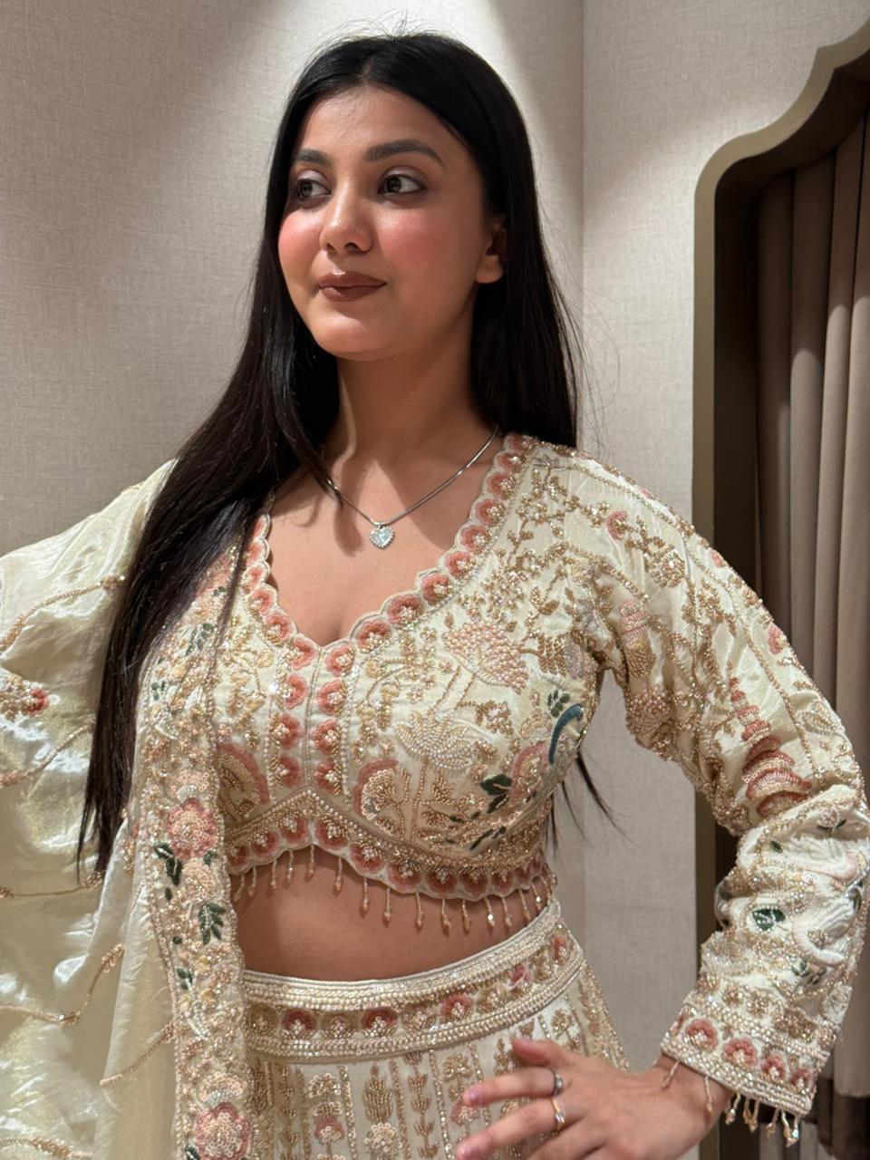 Ivory & Peach Pastel Embroidered Lehenga Set Secondary image