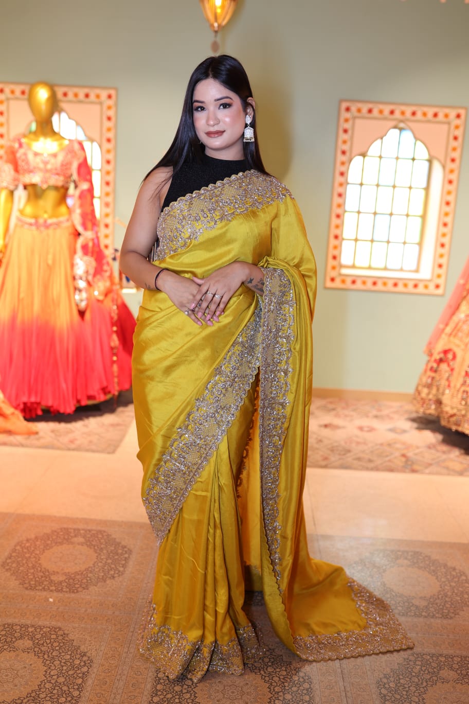 Exquisite Yellow Handloom Saree with Intricate Embroidery