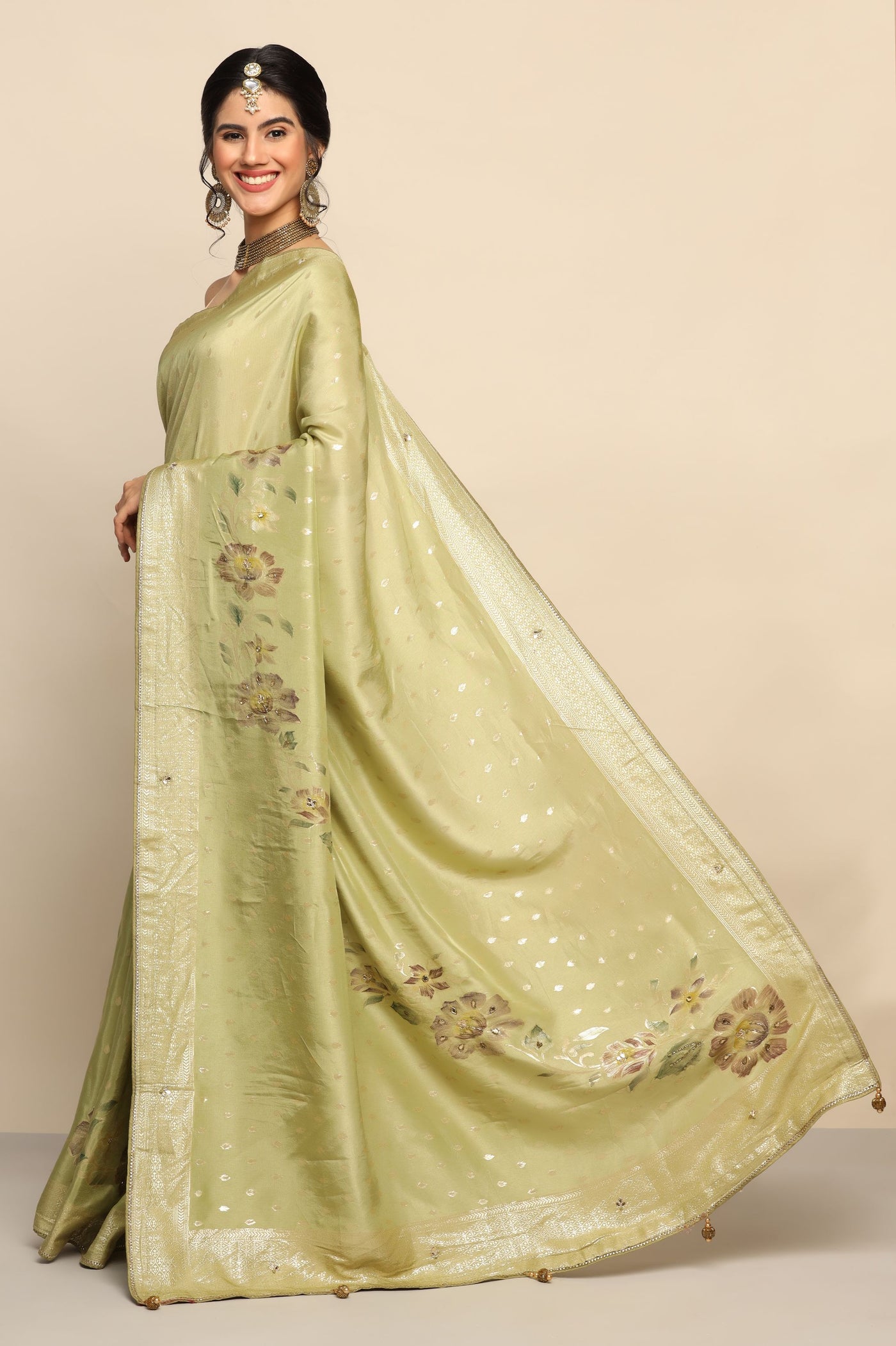 Enchanting Pista Green Silk Saree with Flower Motif and Cut Dana