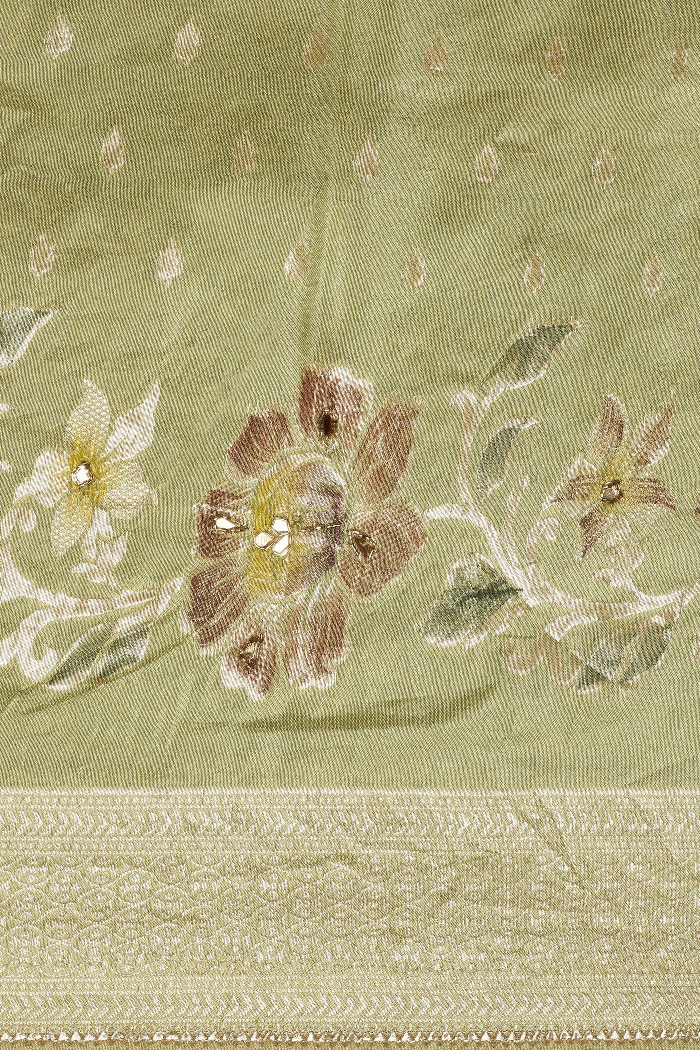 Enchanting Pista Green Silk Saree with Flower Motif and Cut Dana