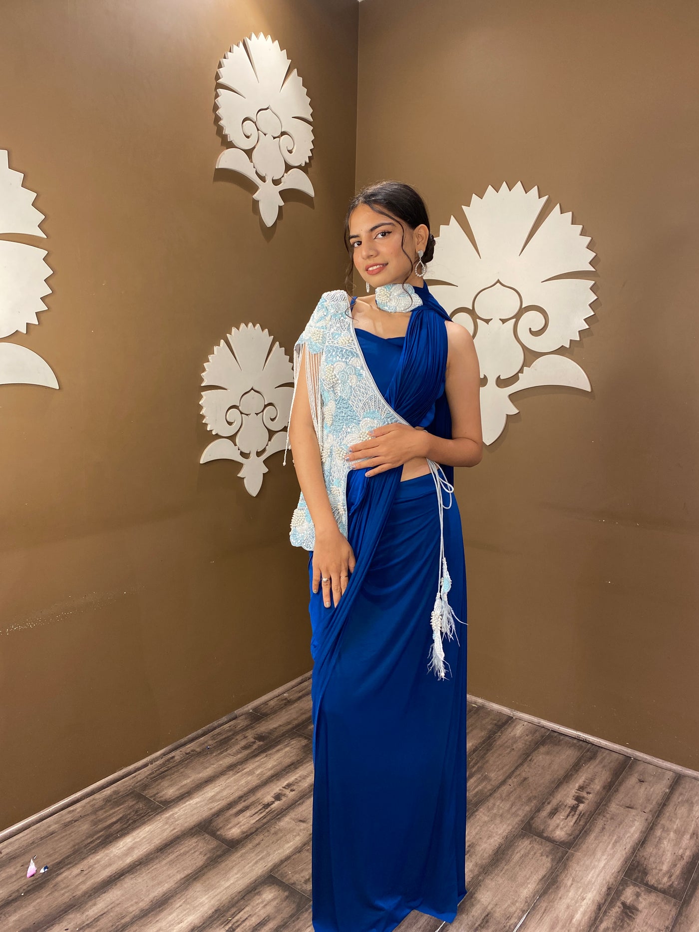Trendy blue color floral motif embroidered  drape saree