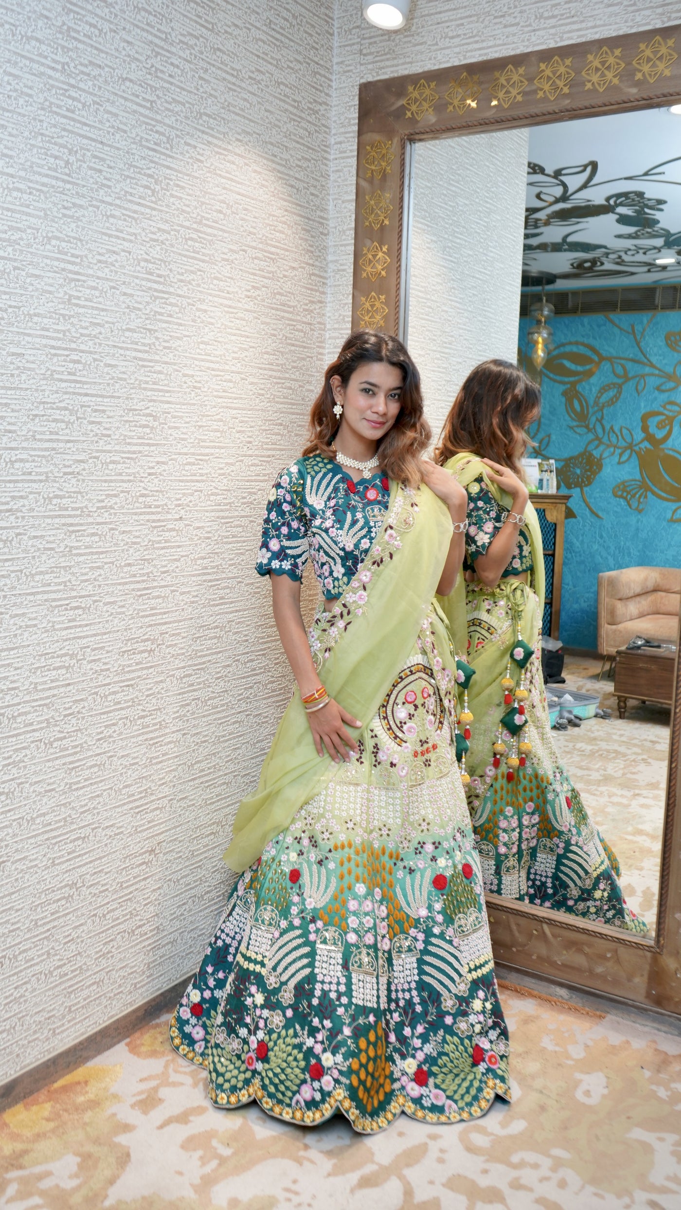 Gorgeous blue and green shaded hand embroidered lehanga
