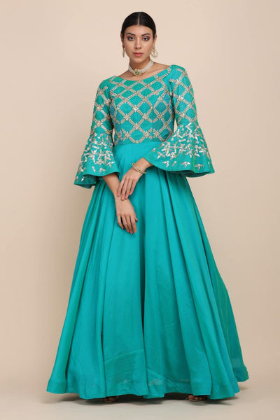 full front look of turquoise dress