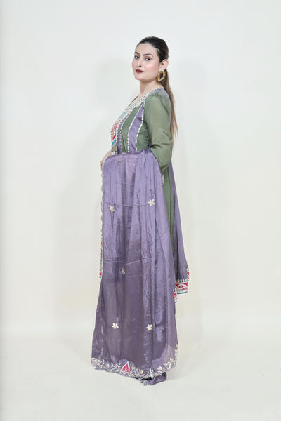girl wearing a kurta and pant set with heavy dupatta