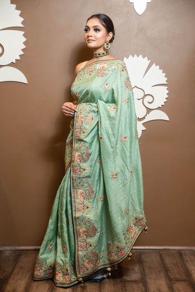 adorable green color floral motif embroidered saree