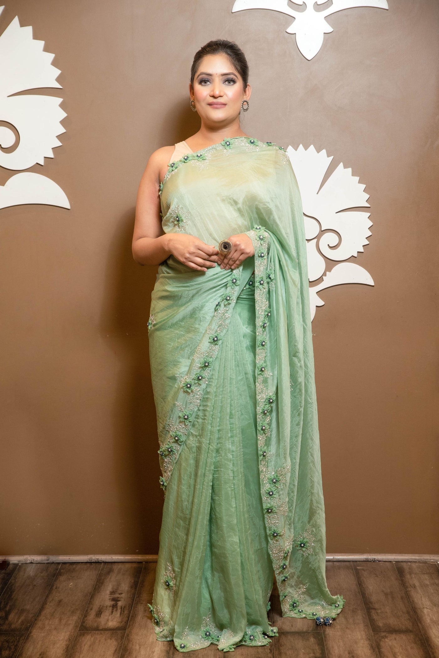 stylish light green color floral motif embroidered saree
