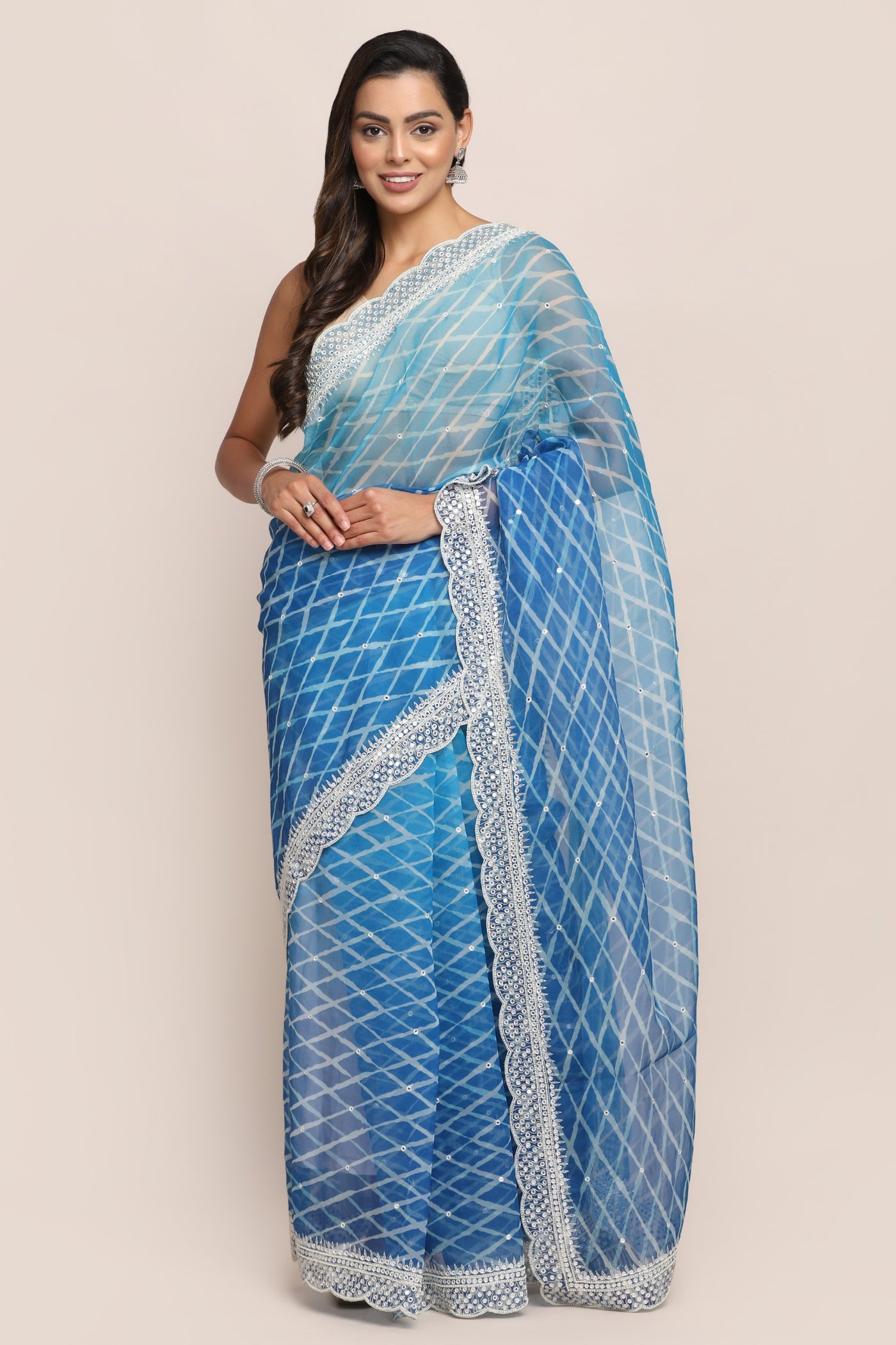 Elegant blue color tie and dyed embroidered saree