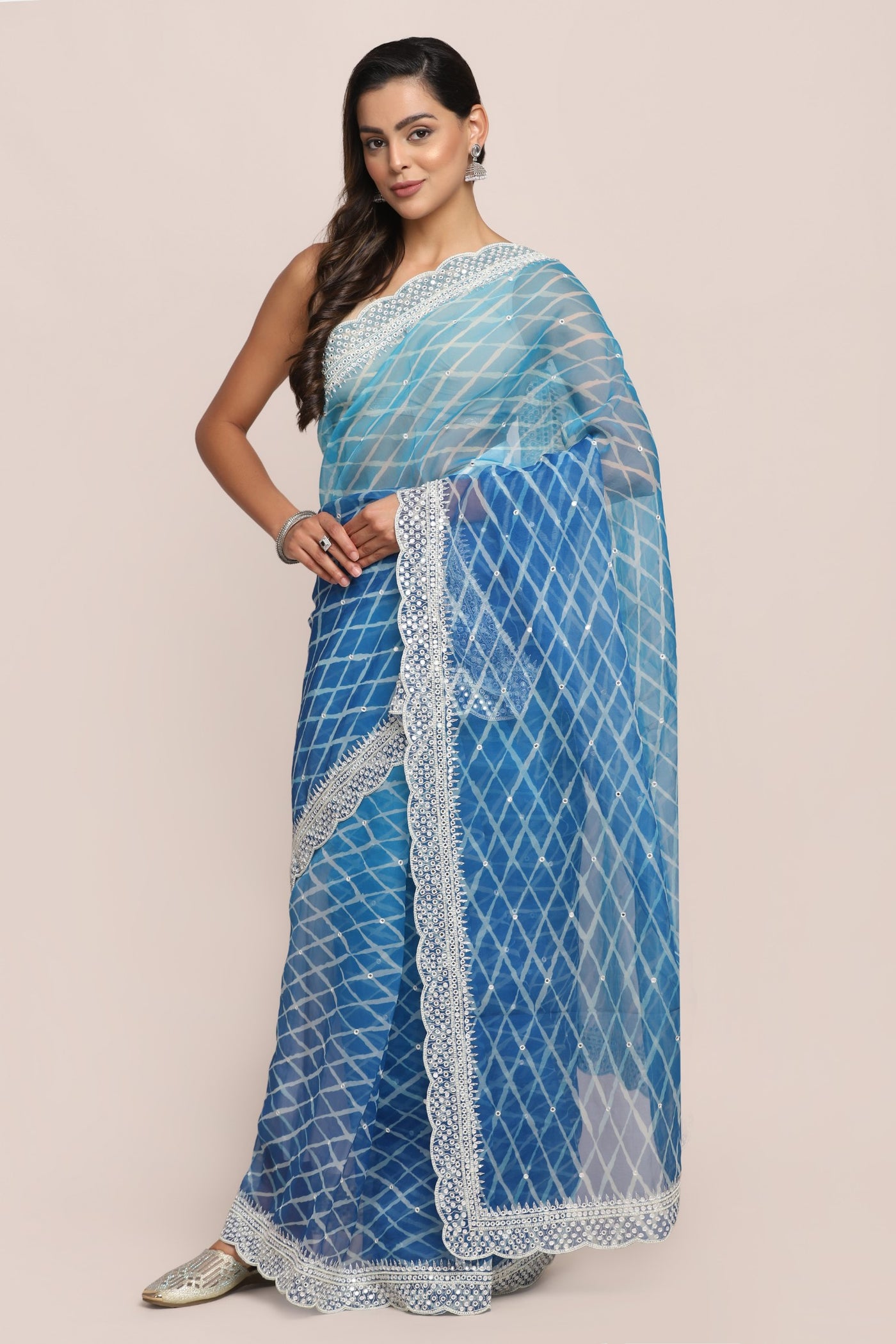 Elegant blue color tie and dyed embroidered saree