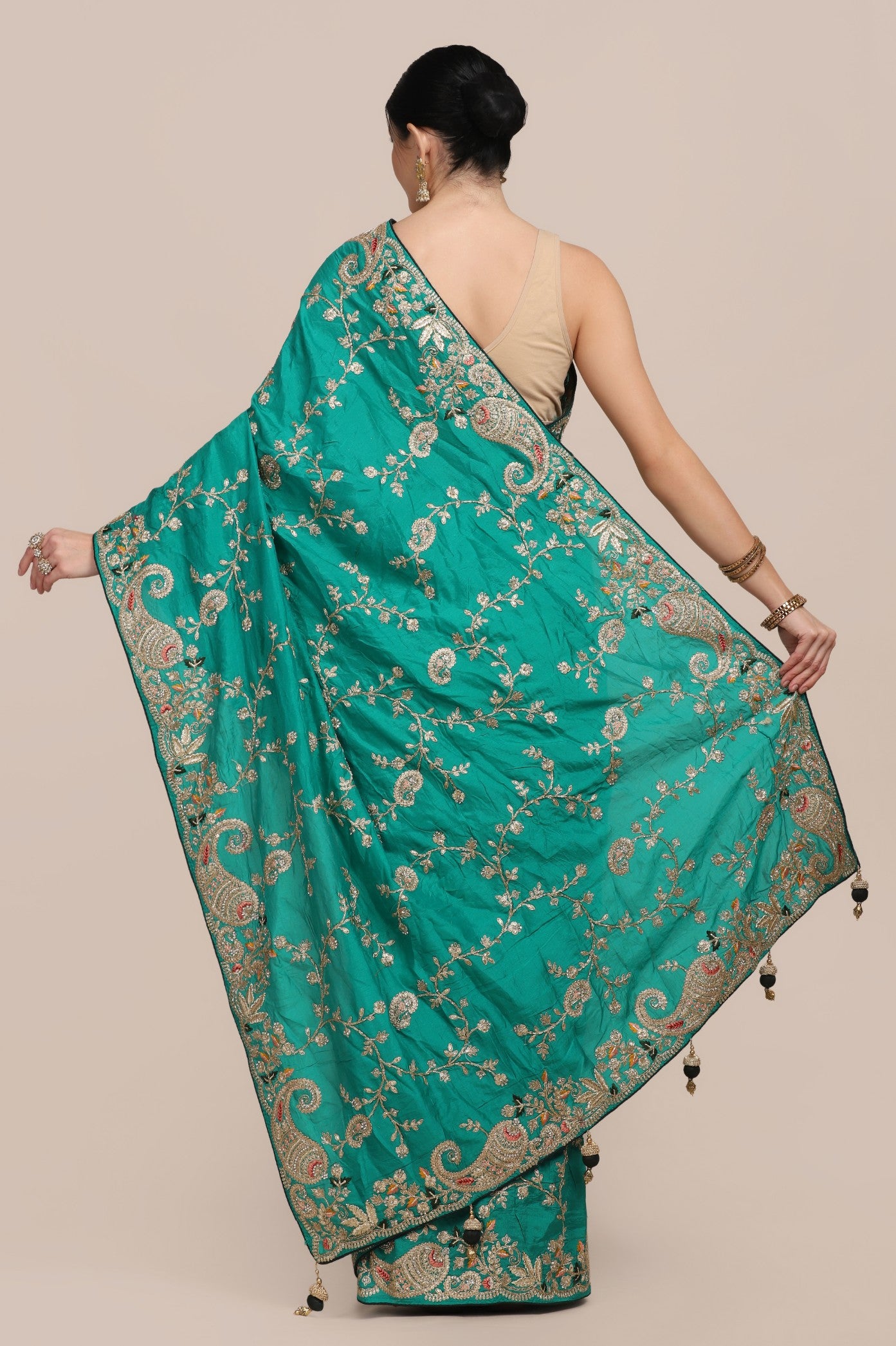 Beautiful peacock green color paisley motif embroidered saree