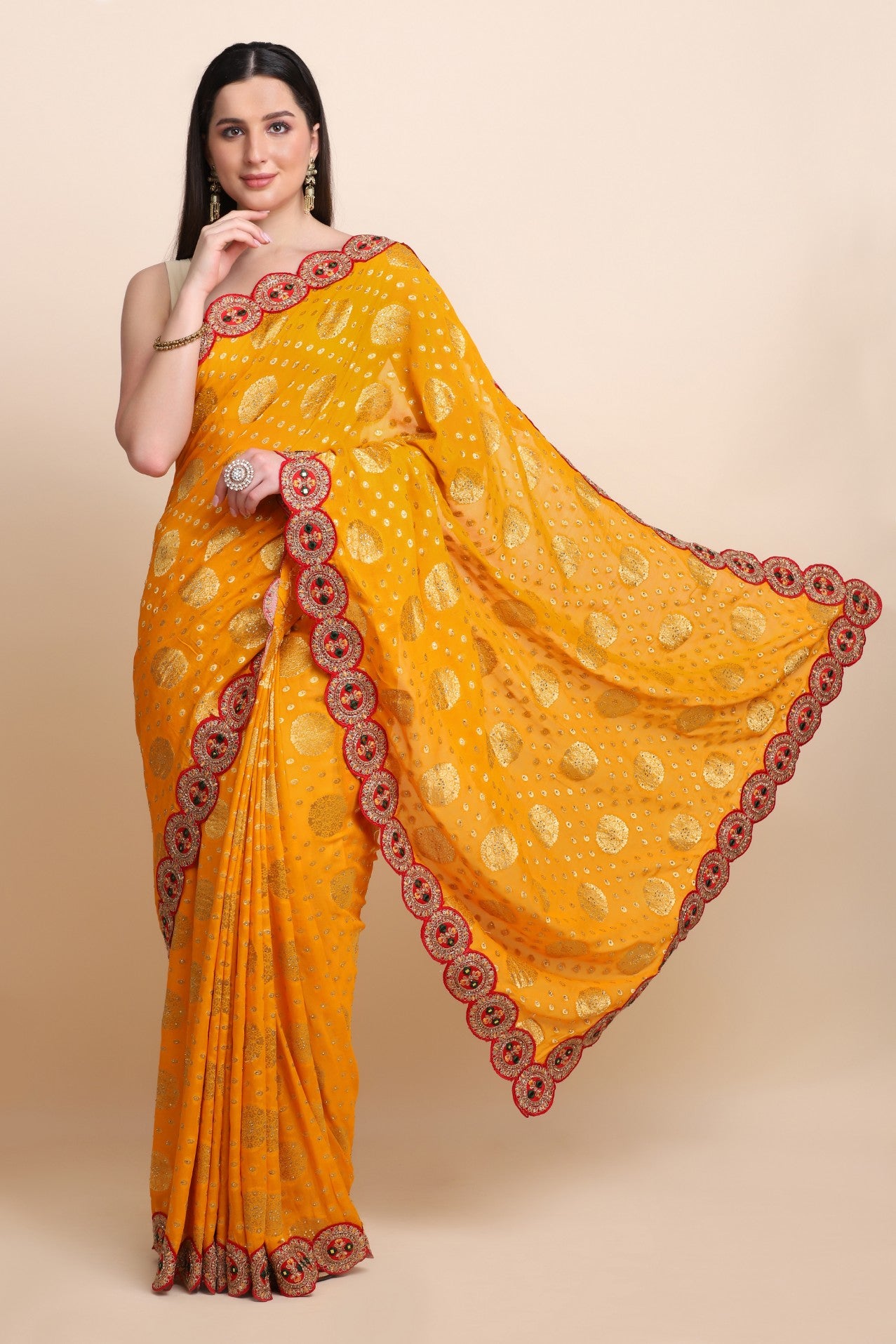 Classic yellow woven highlighted saree with embroidered red scalloped border and matching blouse