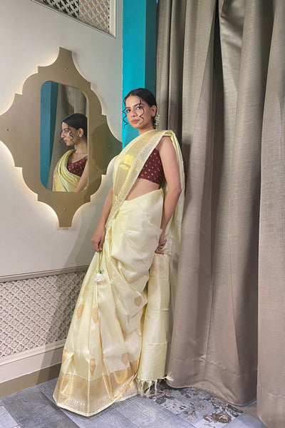 Classic beige and golden hand woven saree
