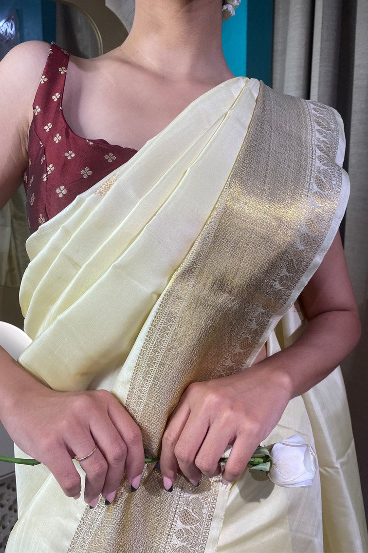 Classic beige and golden hand woven saree