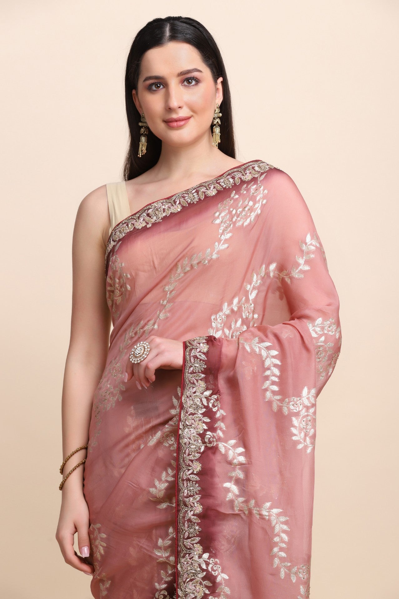 Beautiful peach color woven embroidered saree