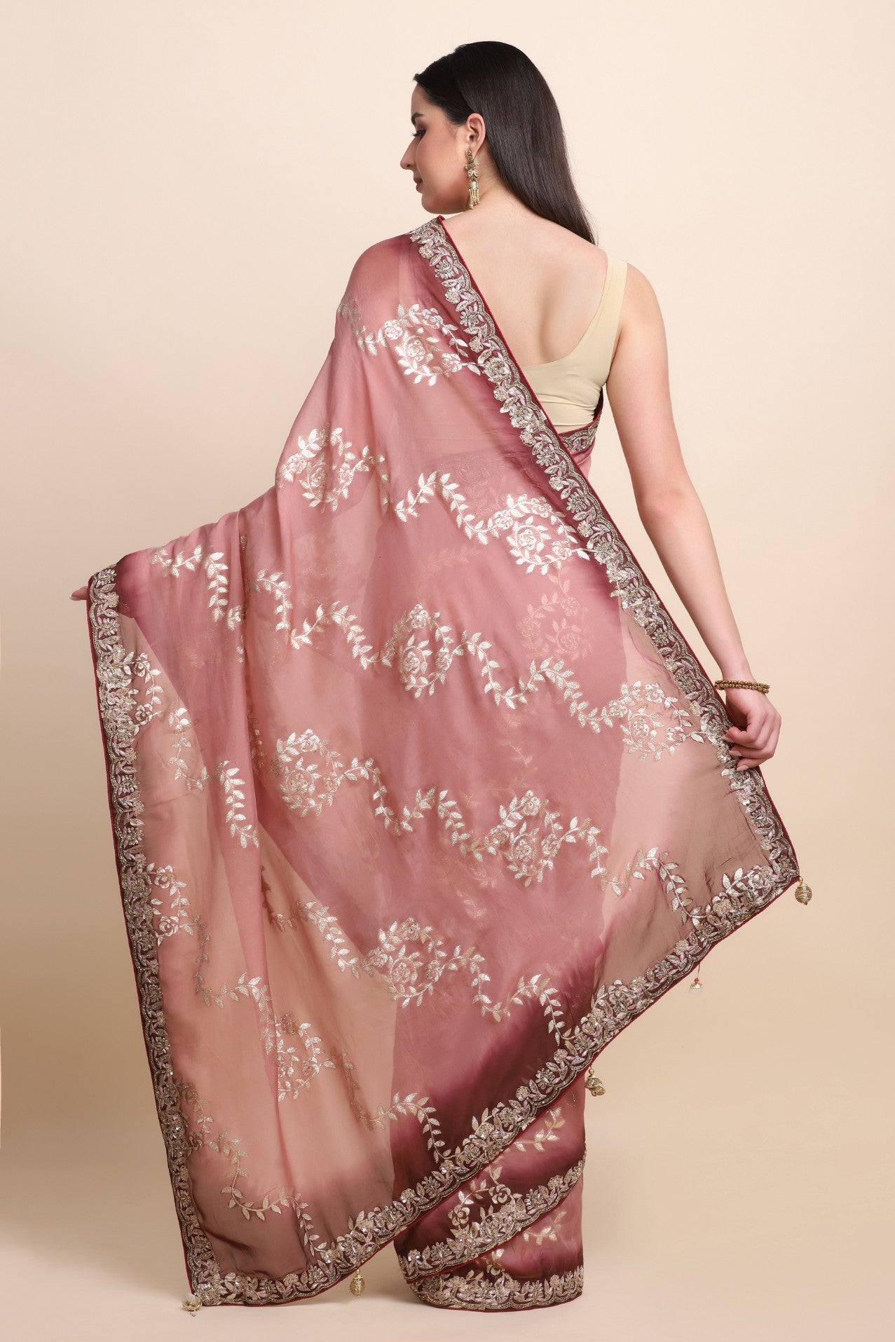 Beautiful peach color woven embroidered saree