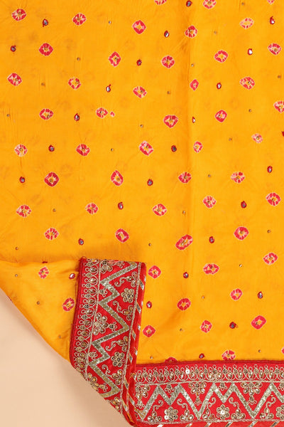 Beautiful yellow color tie & dye bandhini effect saree paired with matching blouse