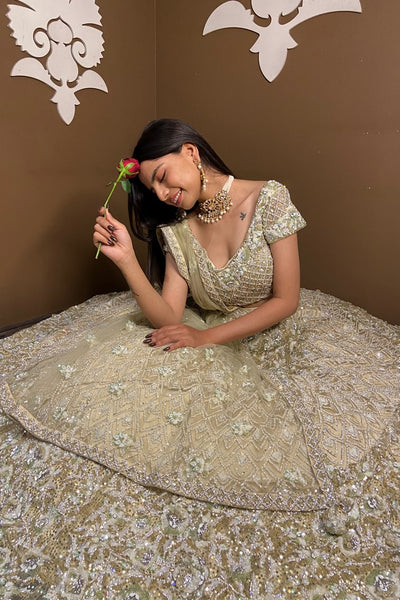 Beautiful light yellow color floral and textured pattern hand embroidered bridal lehanga