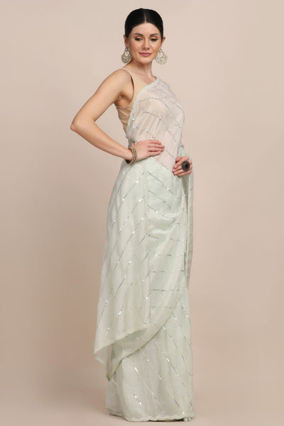 Stylish mint green color sequin striped saree
