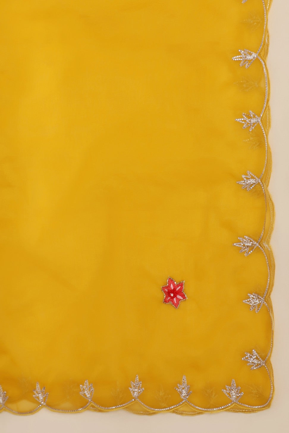 detail on dupatta of yellow embroidered kurti