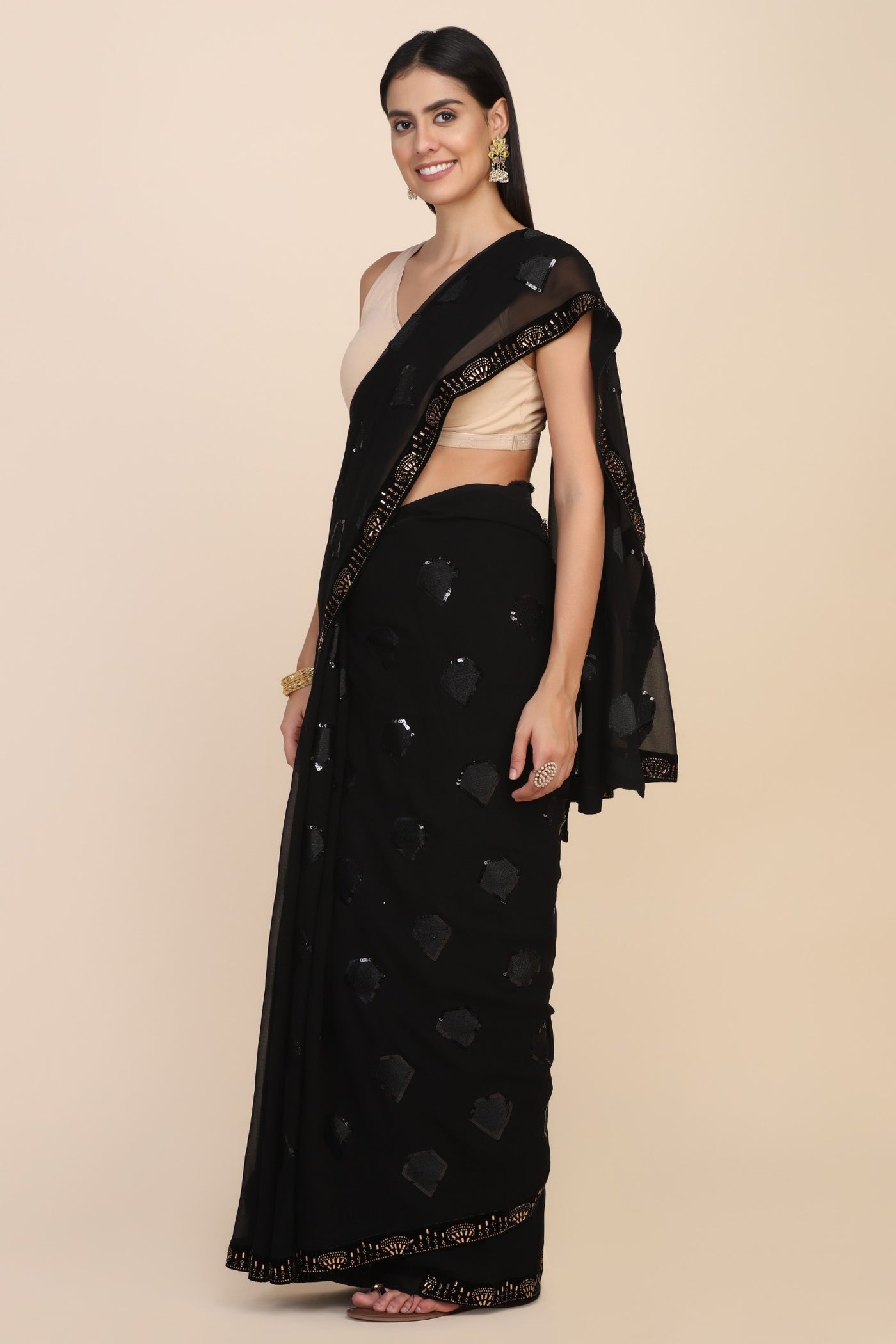 Classy black color geometrical motif embroidered saree
