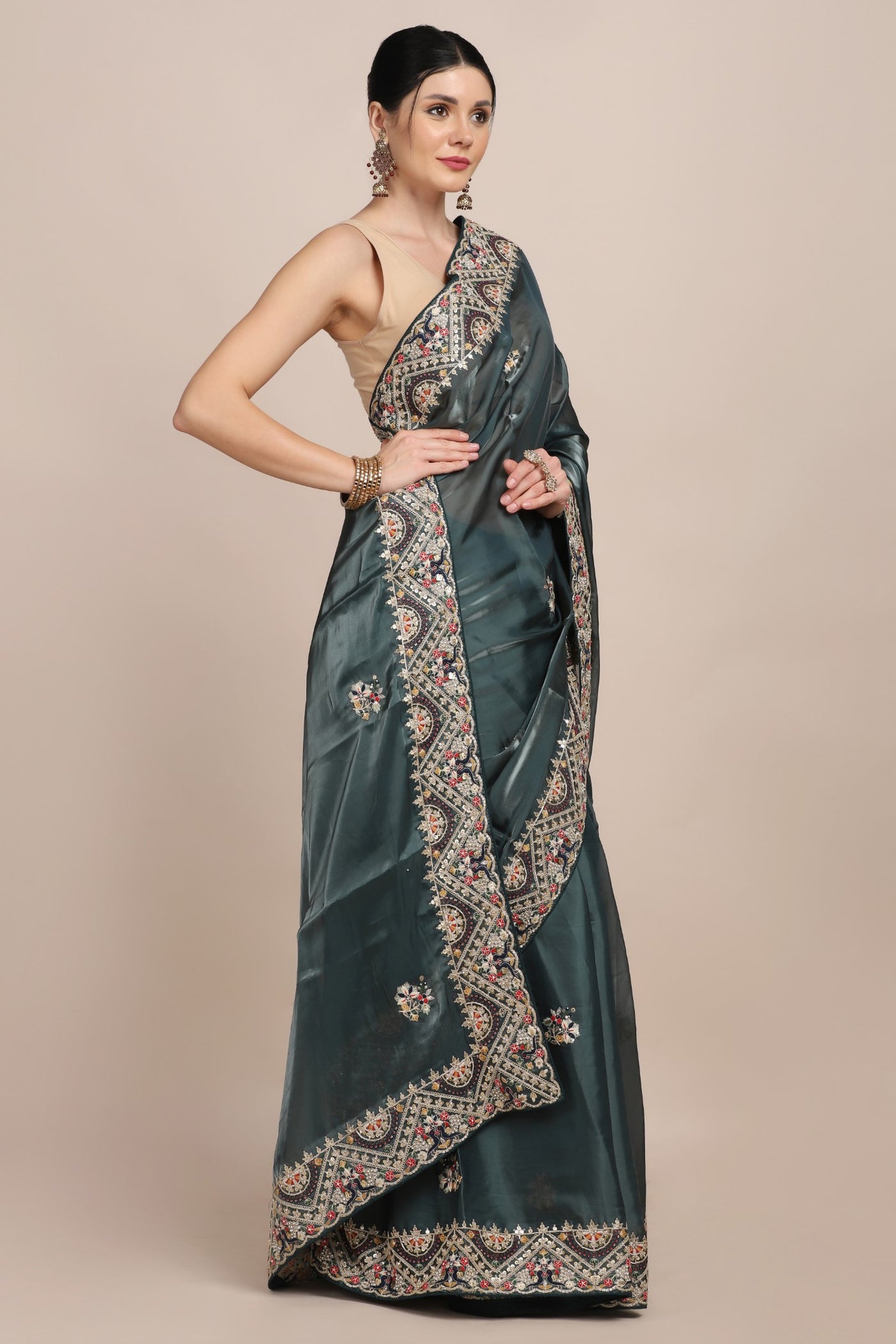 Beautiful bottle green color floral motif embroidered saree