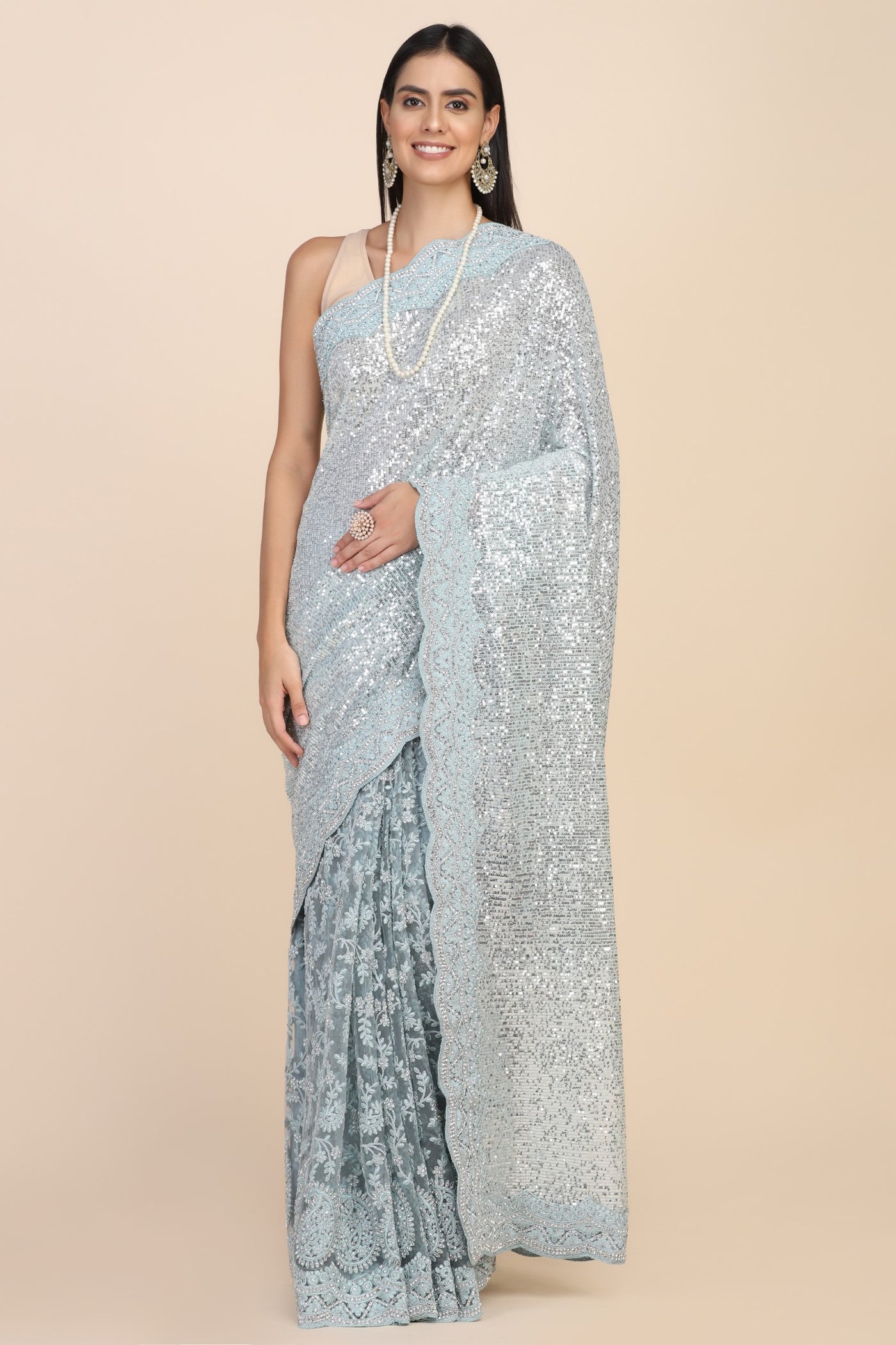 Elegant blue color sequins half & half saree