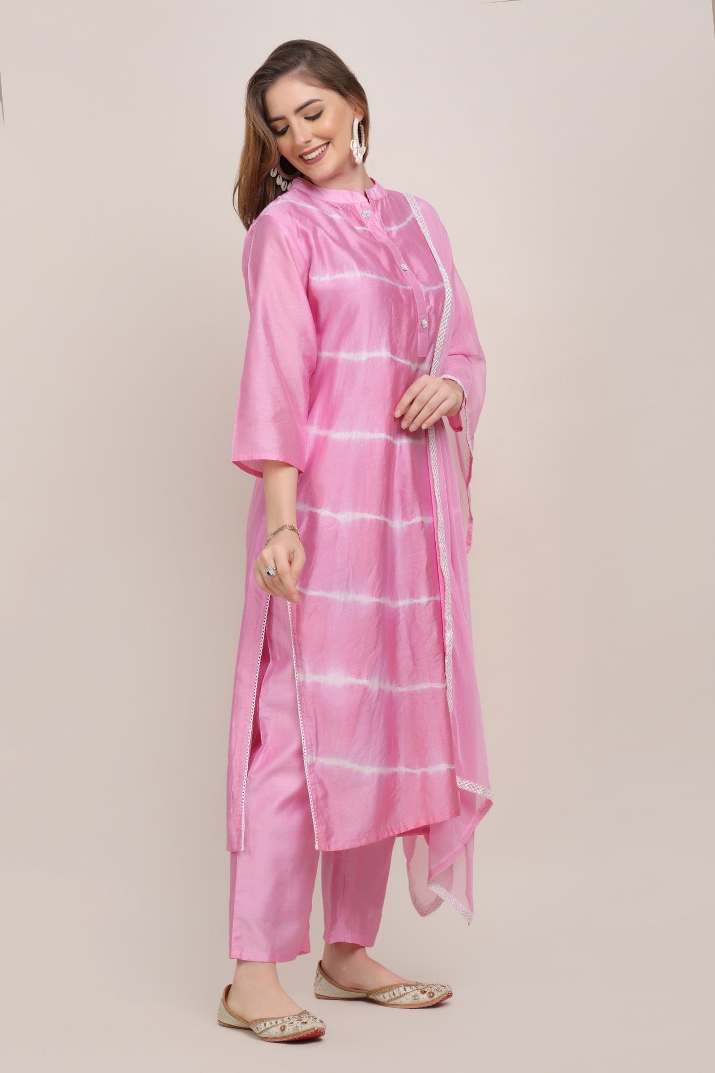 model posing wearing tie and dyed kurti