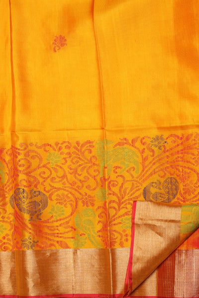 Adorable yellow color floral motif woven saree