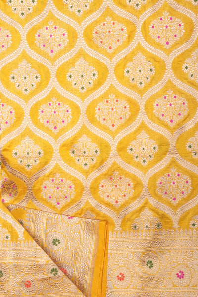 Classy yellow color floral motif handwoven saree