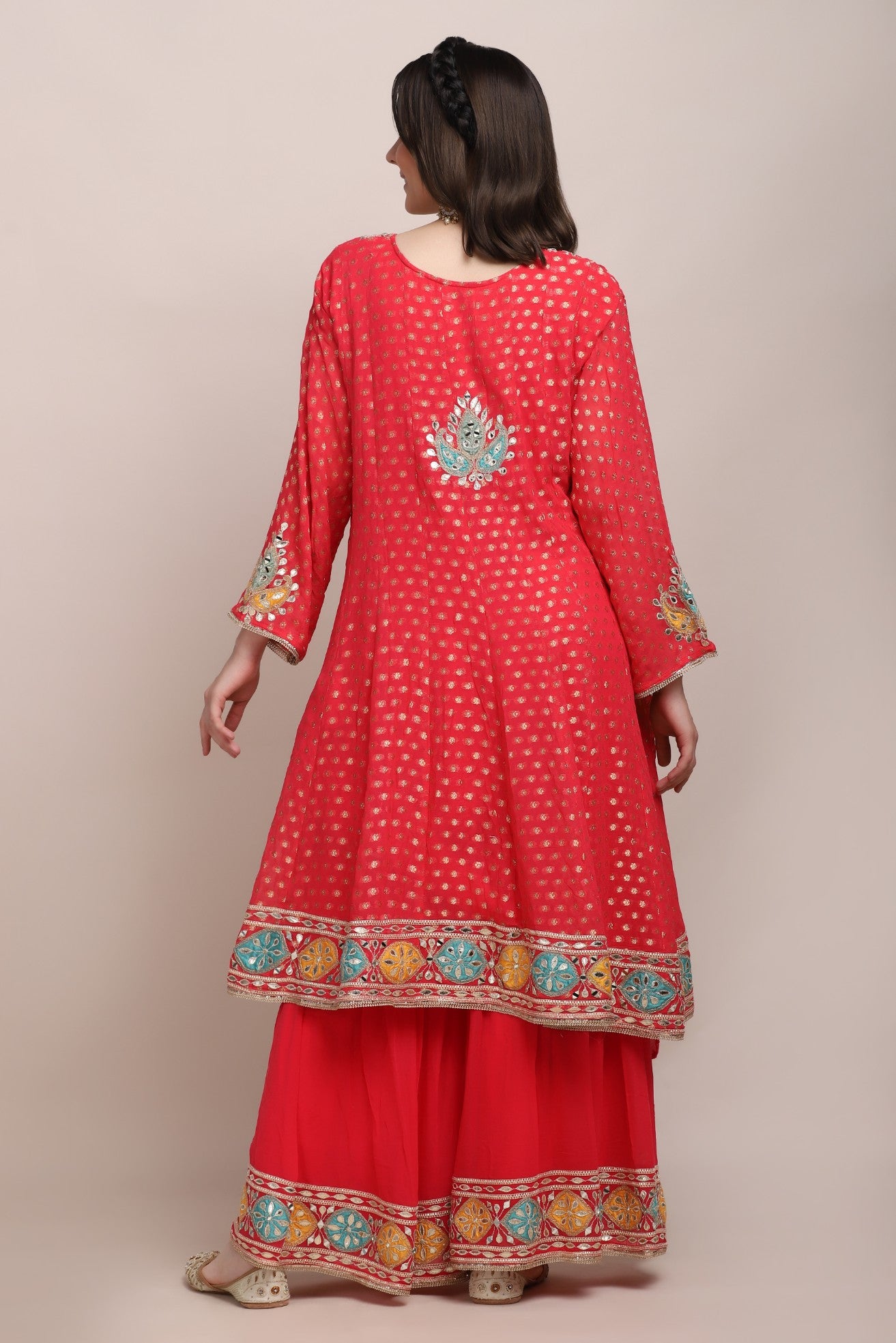 full back look of trendy embroidered kurti set without dupatta