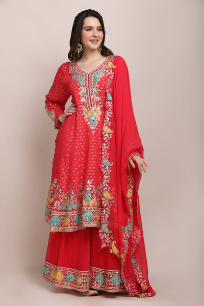 model posing wearing trendy embroidered kurti set