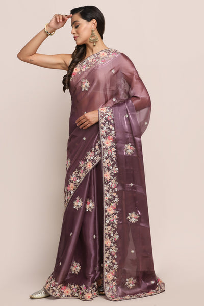 Classy purple color floral motif embroidered saree