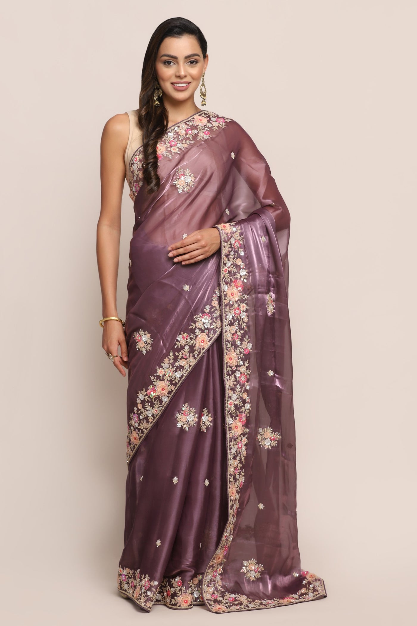 Classy purple color floral motif embroidered saree