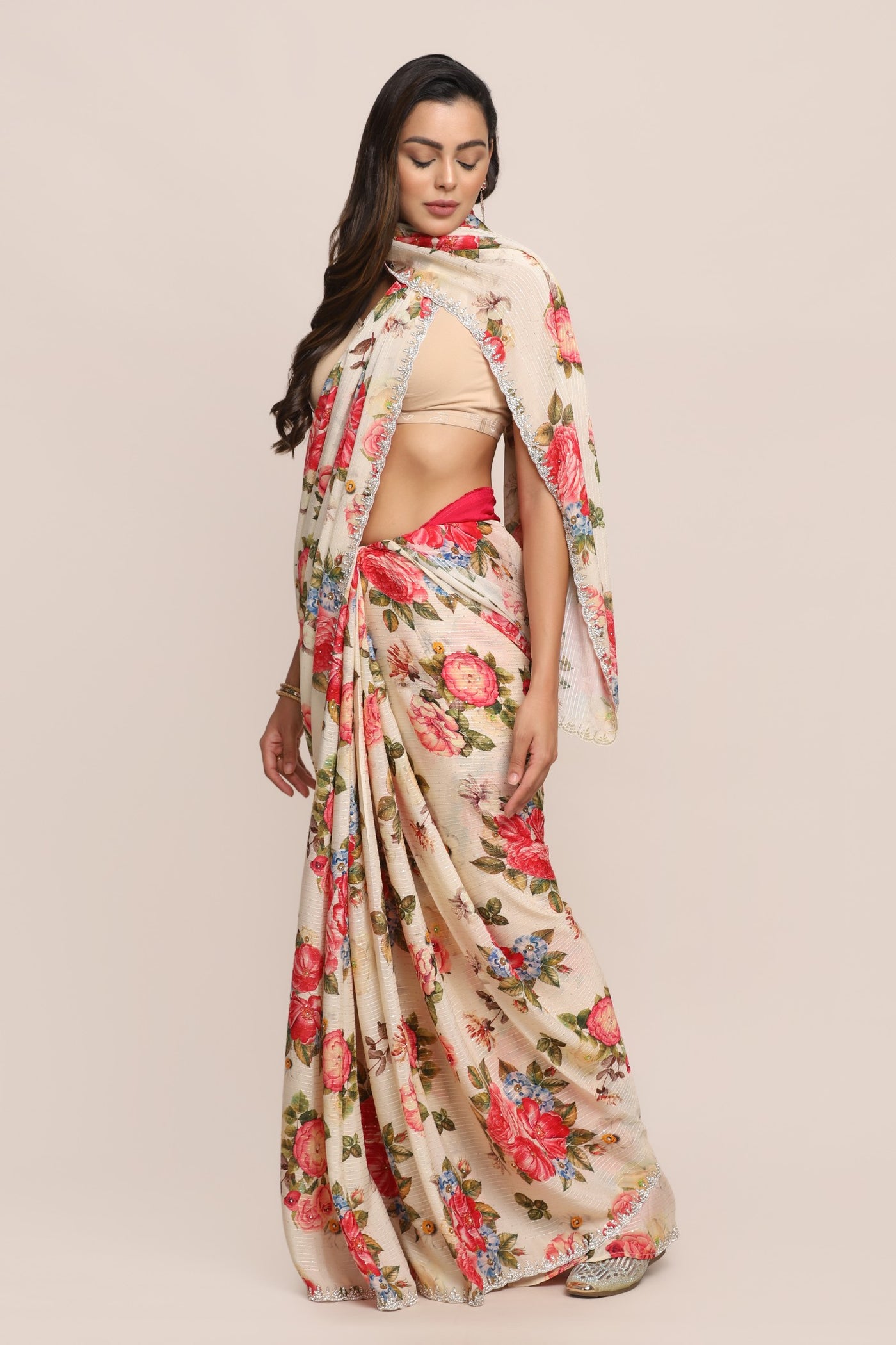 Stylish off white color floral motif embroidered saree