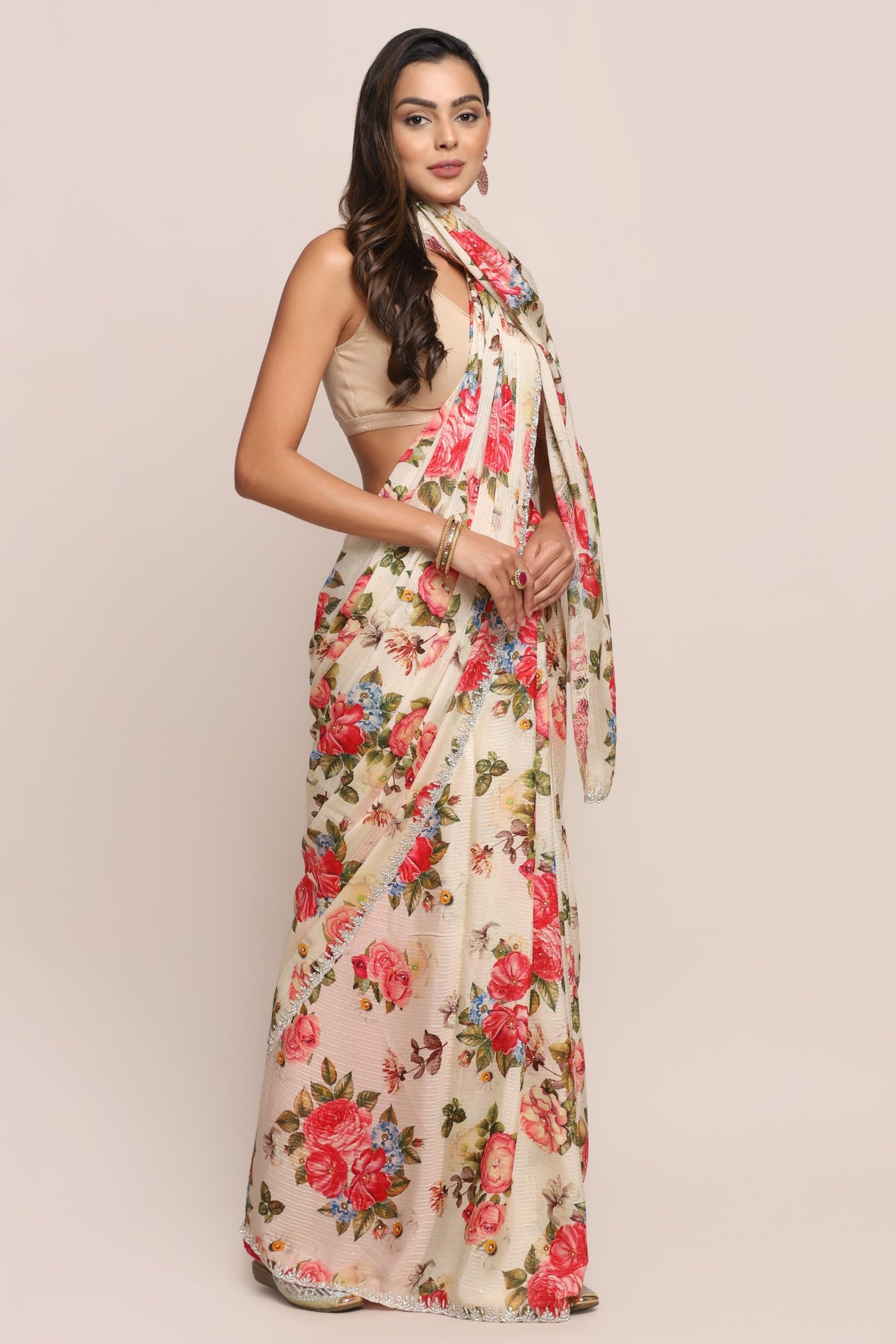 Stylish off white color floral motif embroidered saree