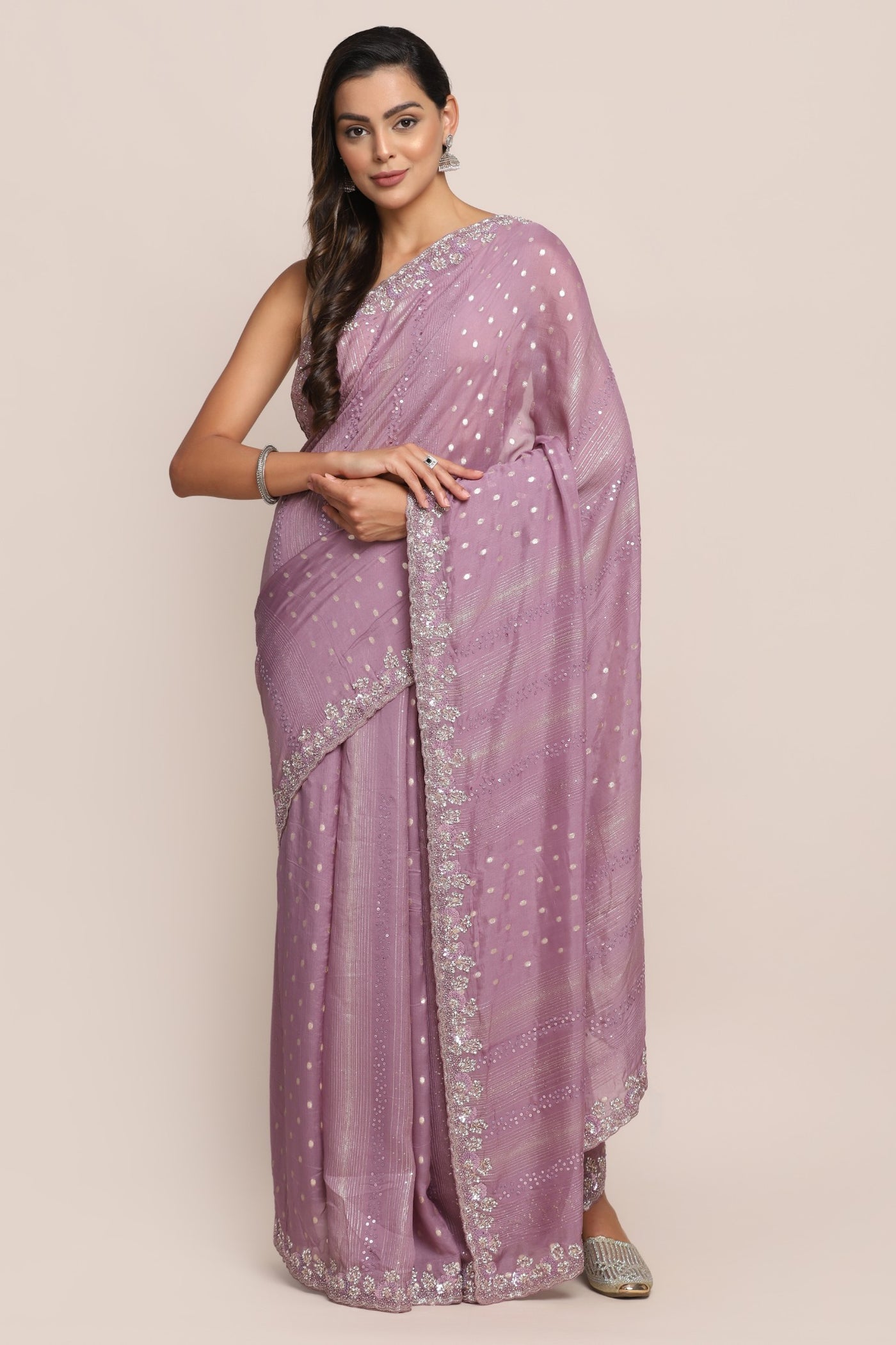 Attractive onion pink color floral motif embroidered saree