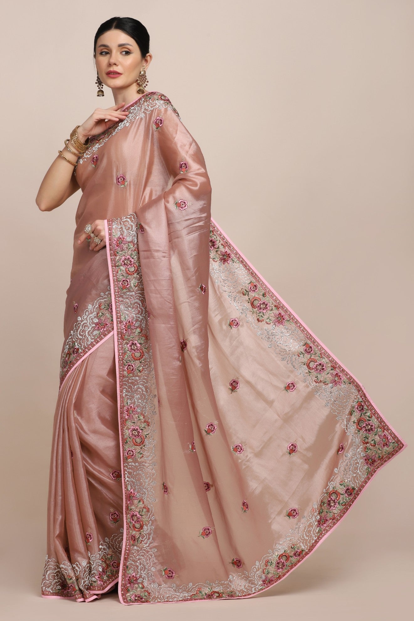 Model in Onion pink floral embroidered saree