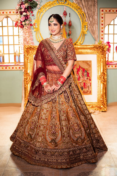 Beautiful Red And Mustard Colored Hand Embroidered Bridal Lehenga Set
