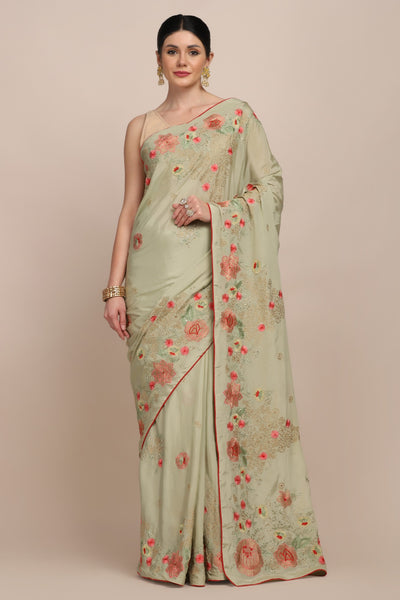 Adorable green color floral motif embroidered saree