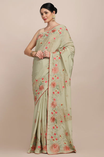 Adorable green color floral motif embroidered saree