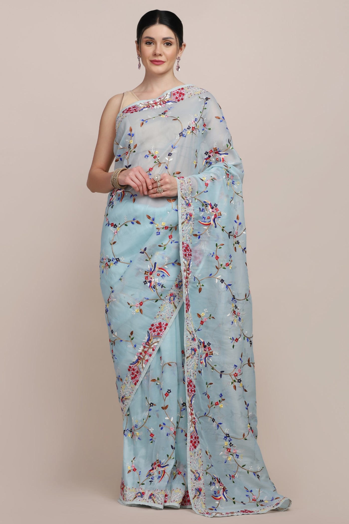 Elegant sky blue color floral motif embroidered saree