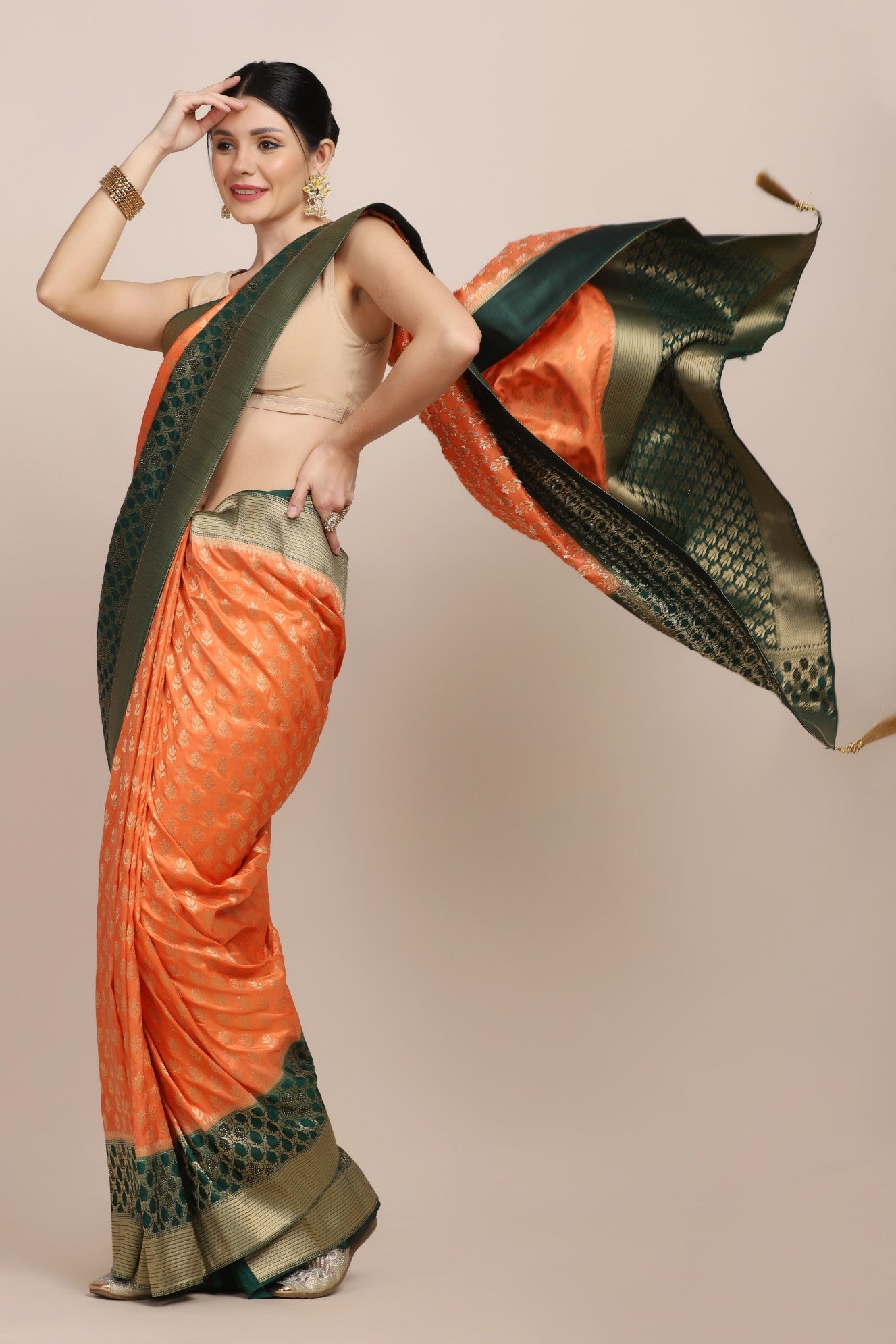 Classy orange color floral motif woven saree