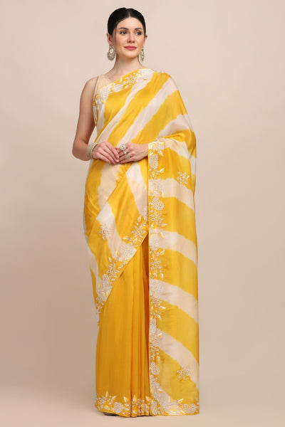 Elegant yellow color tie and dye embroidered saree