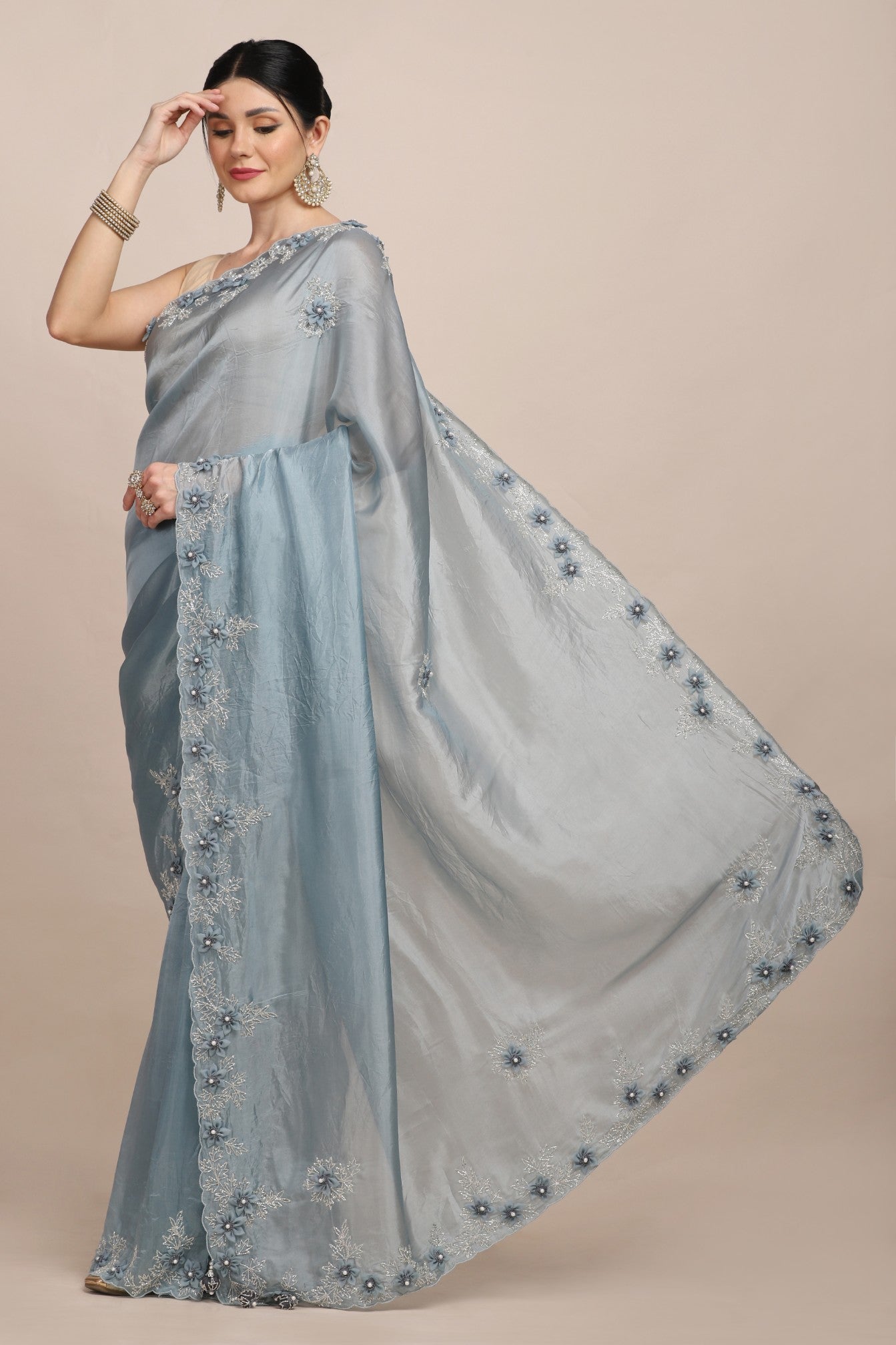 Stylish light blue color floral motif embroidered saree
